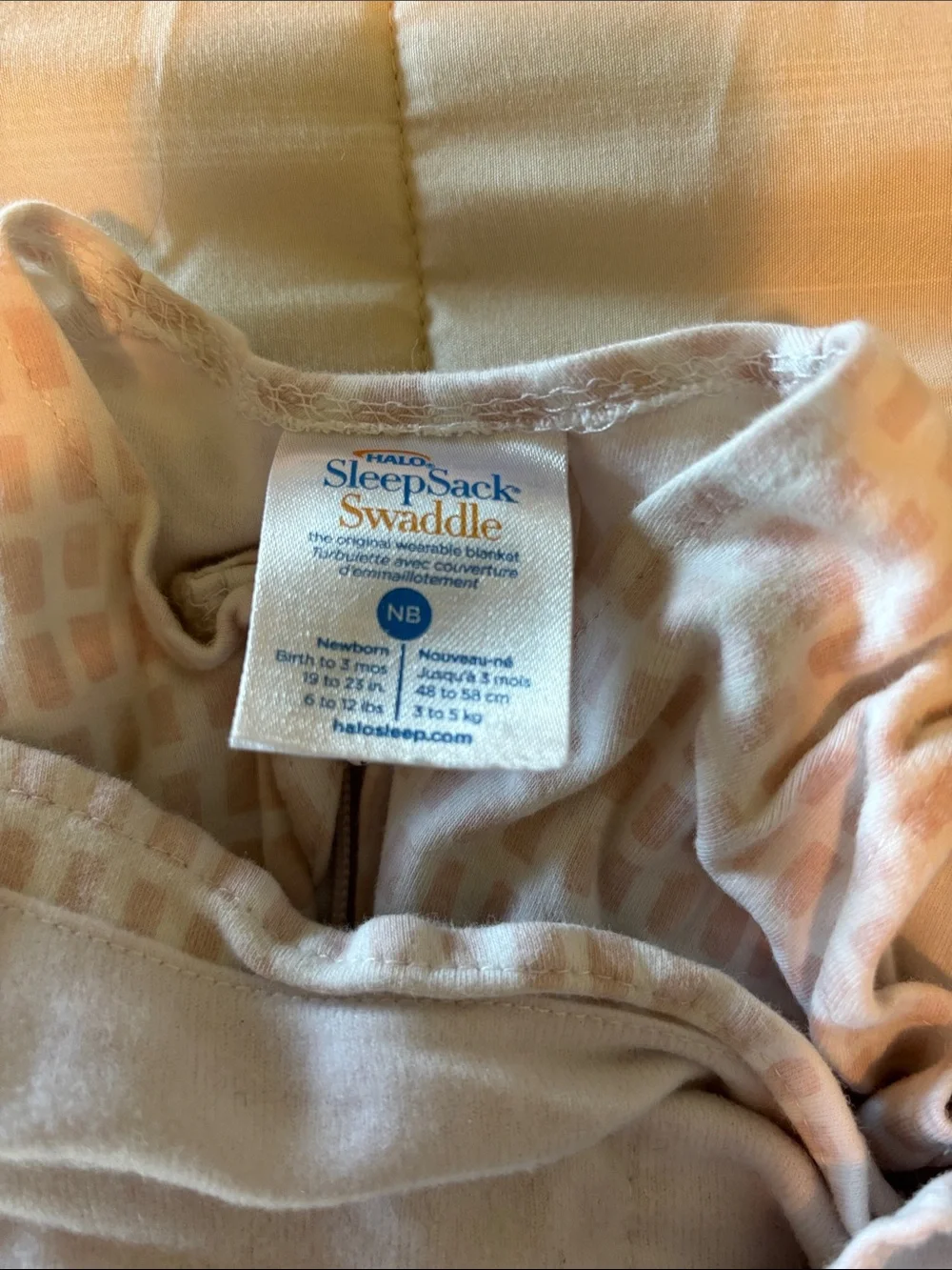 Halo SleepSack Swaddle in Beige with Light Pink Grid - Picture 2 of 4